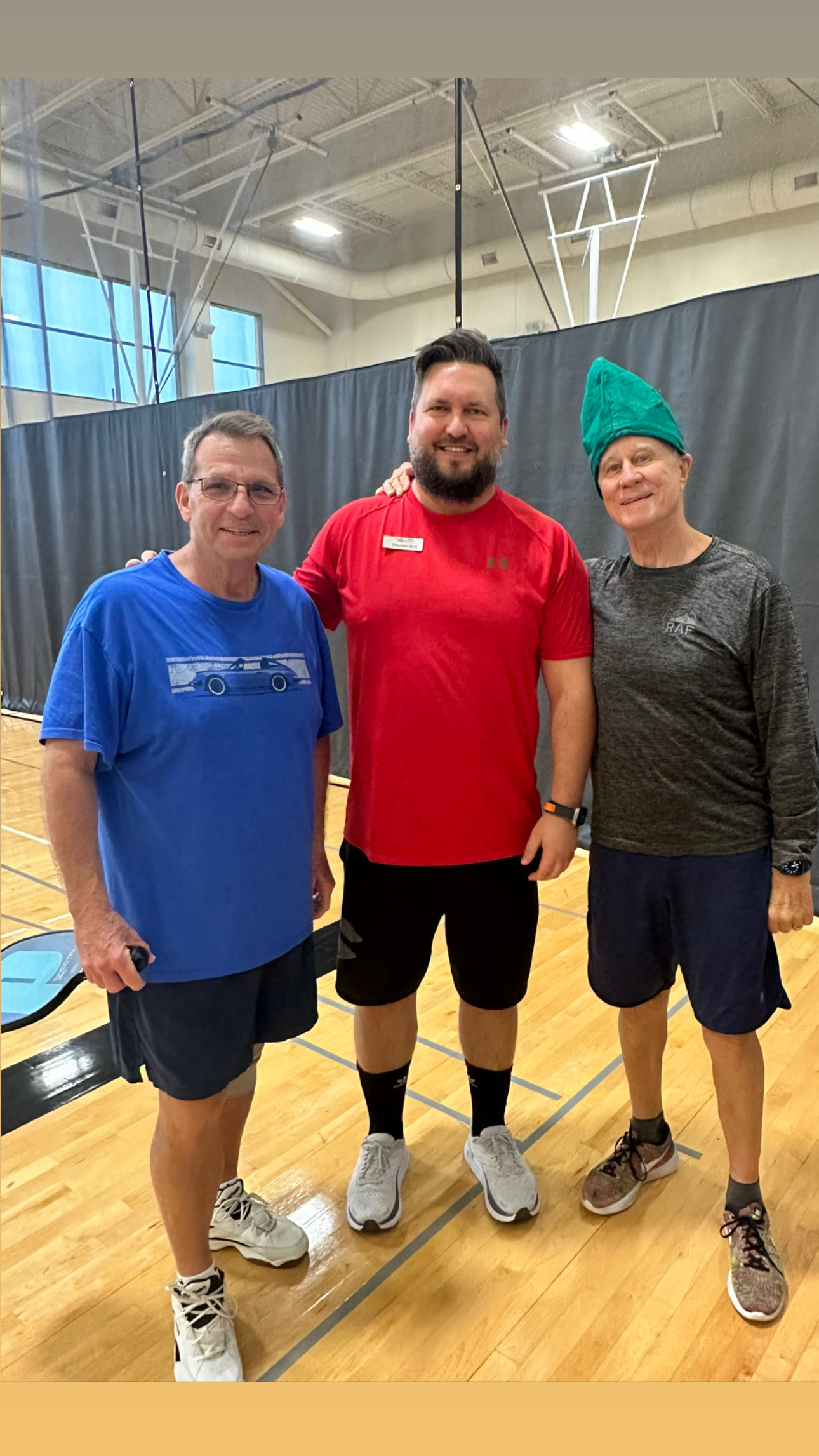 Stephen is a top ElderFIT personal trainer for seniors in The Woodlands and here he is standing in a gym with 2 male senior customers smiling at the camera